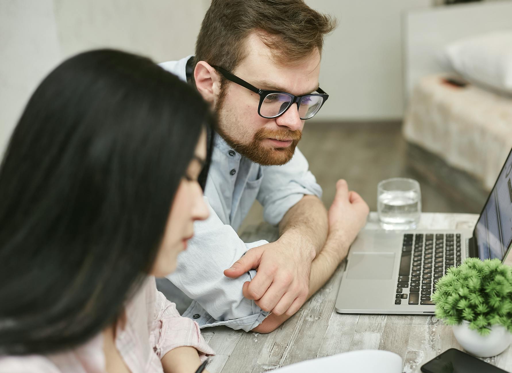 A business owner looking intently at documents