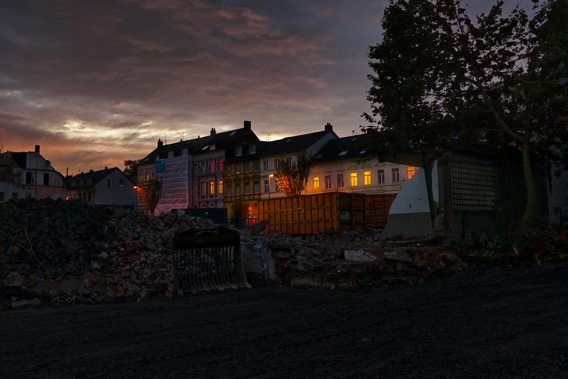 Facade of Illuminated Houses in the Evening