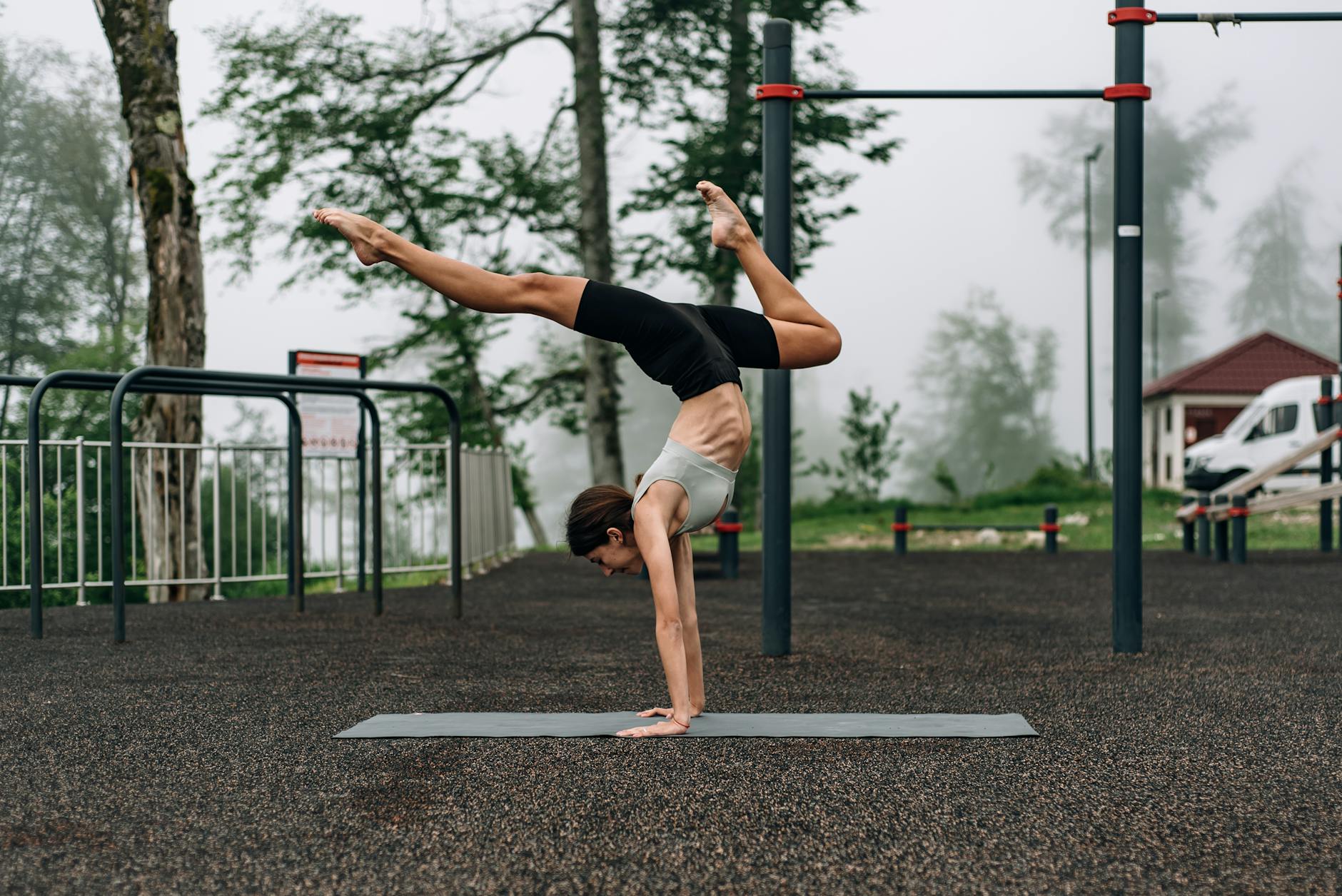 Pretty Woman Doing a Hand Stand