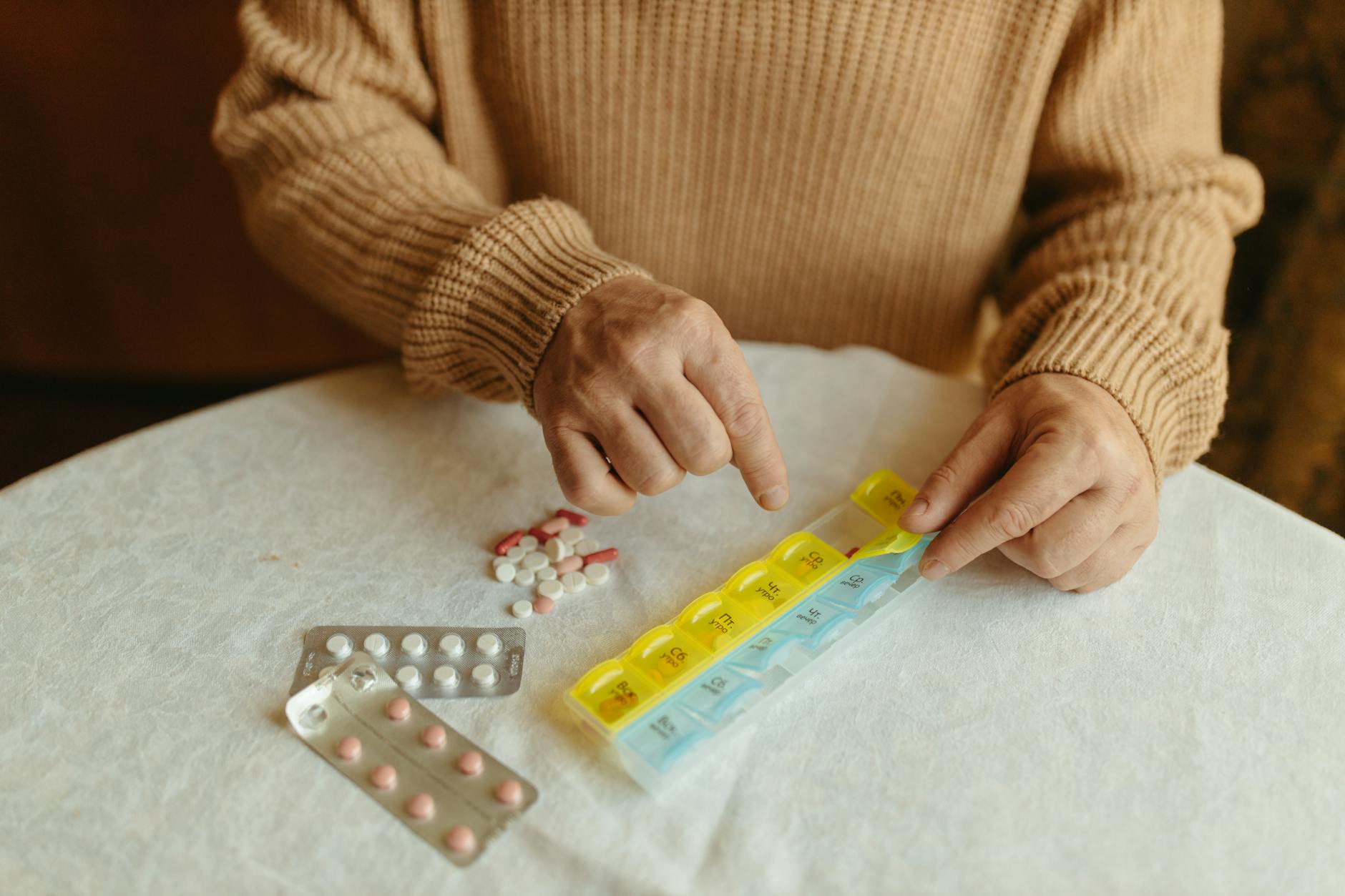 Person Organizing his Medicines