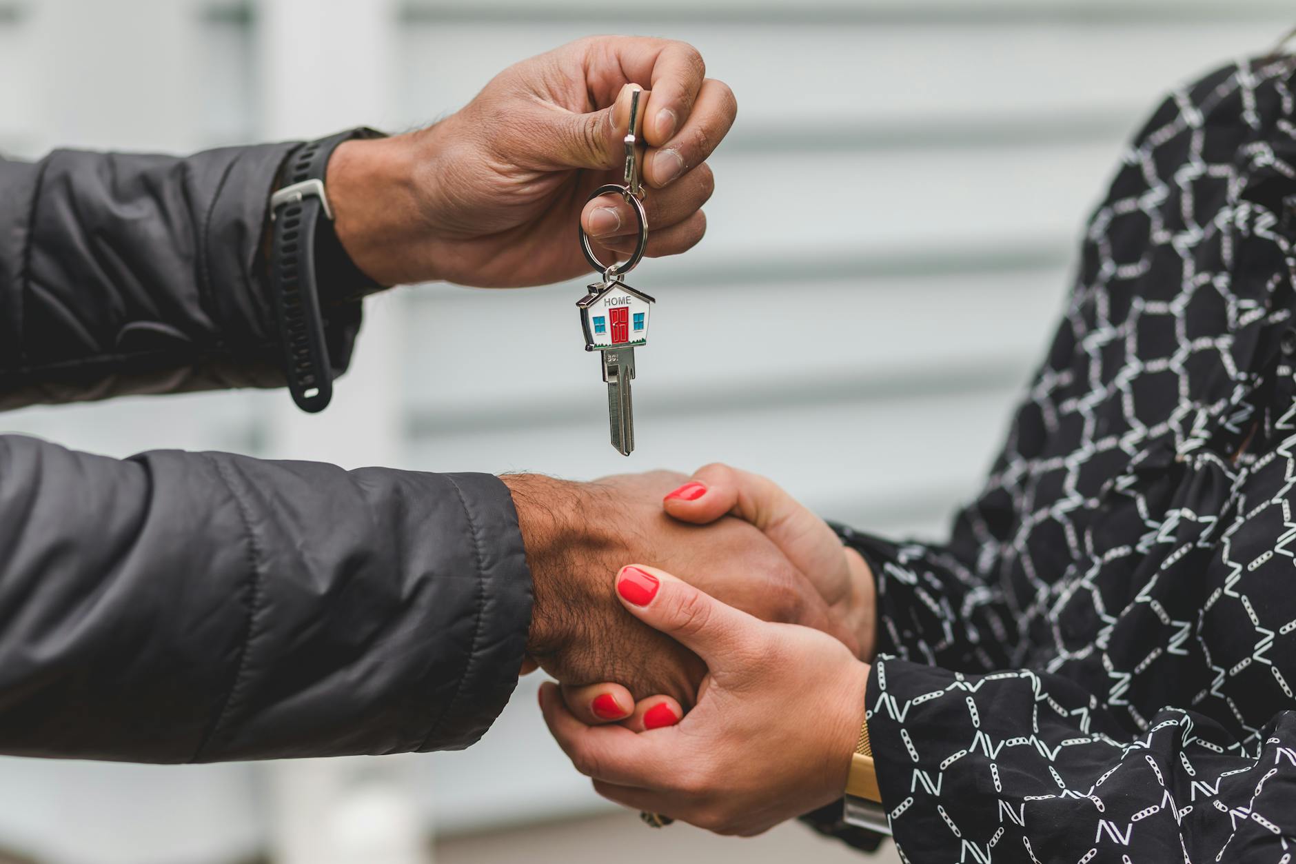 Person holding a house key