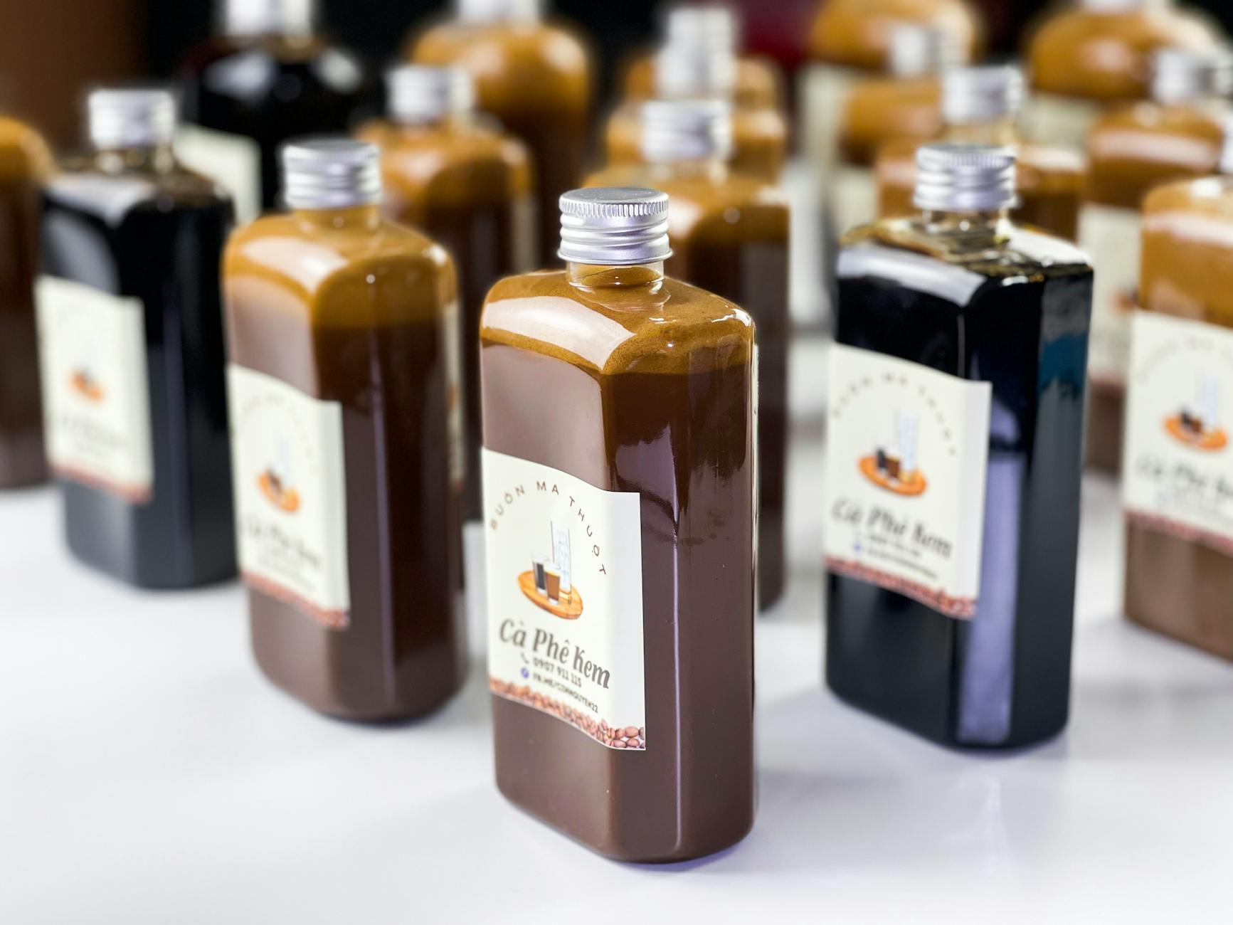Bottles containing various sweet syrups