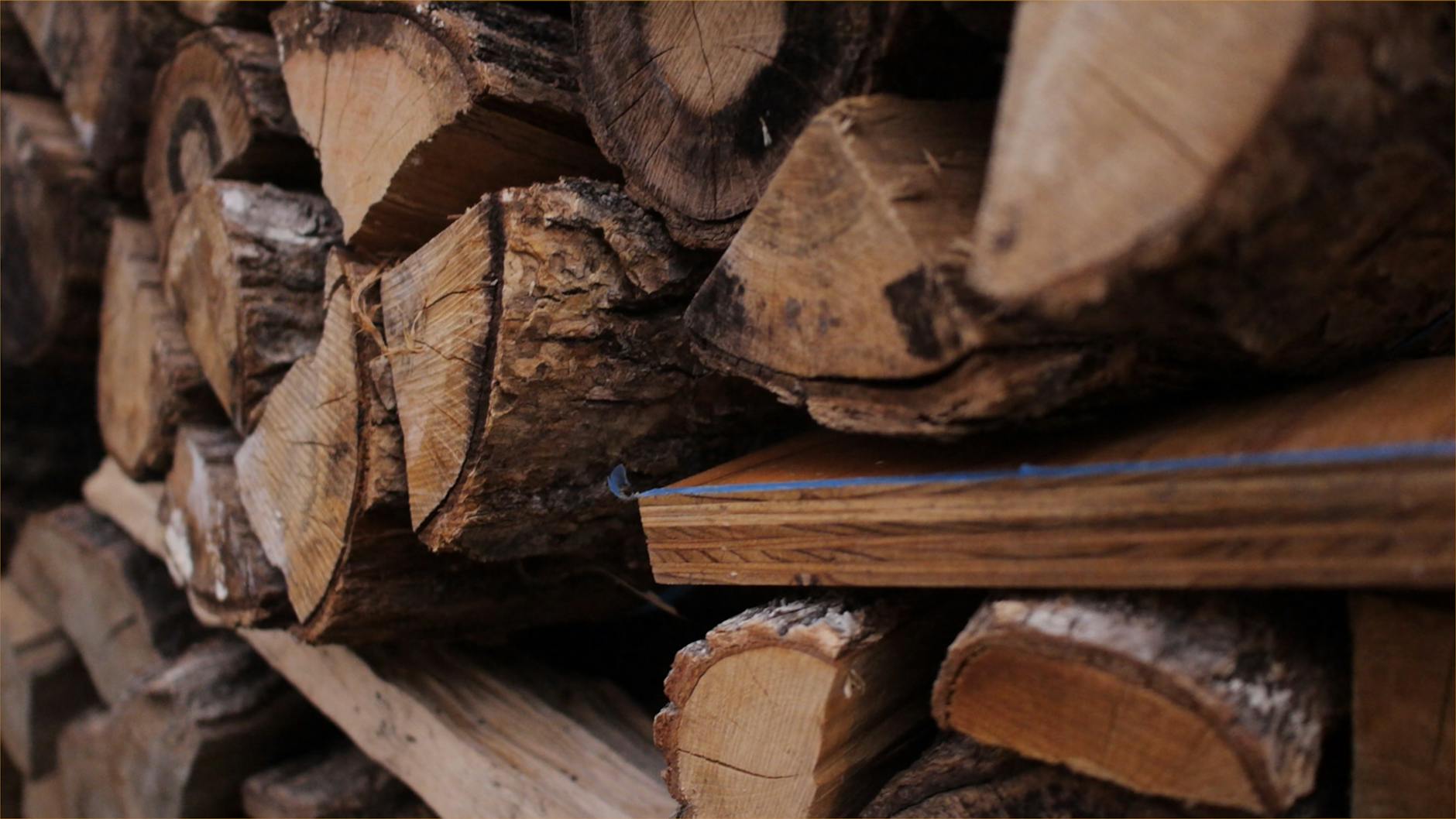 Close-Up Shot of Stack of Firewoods