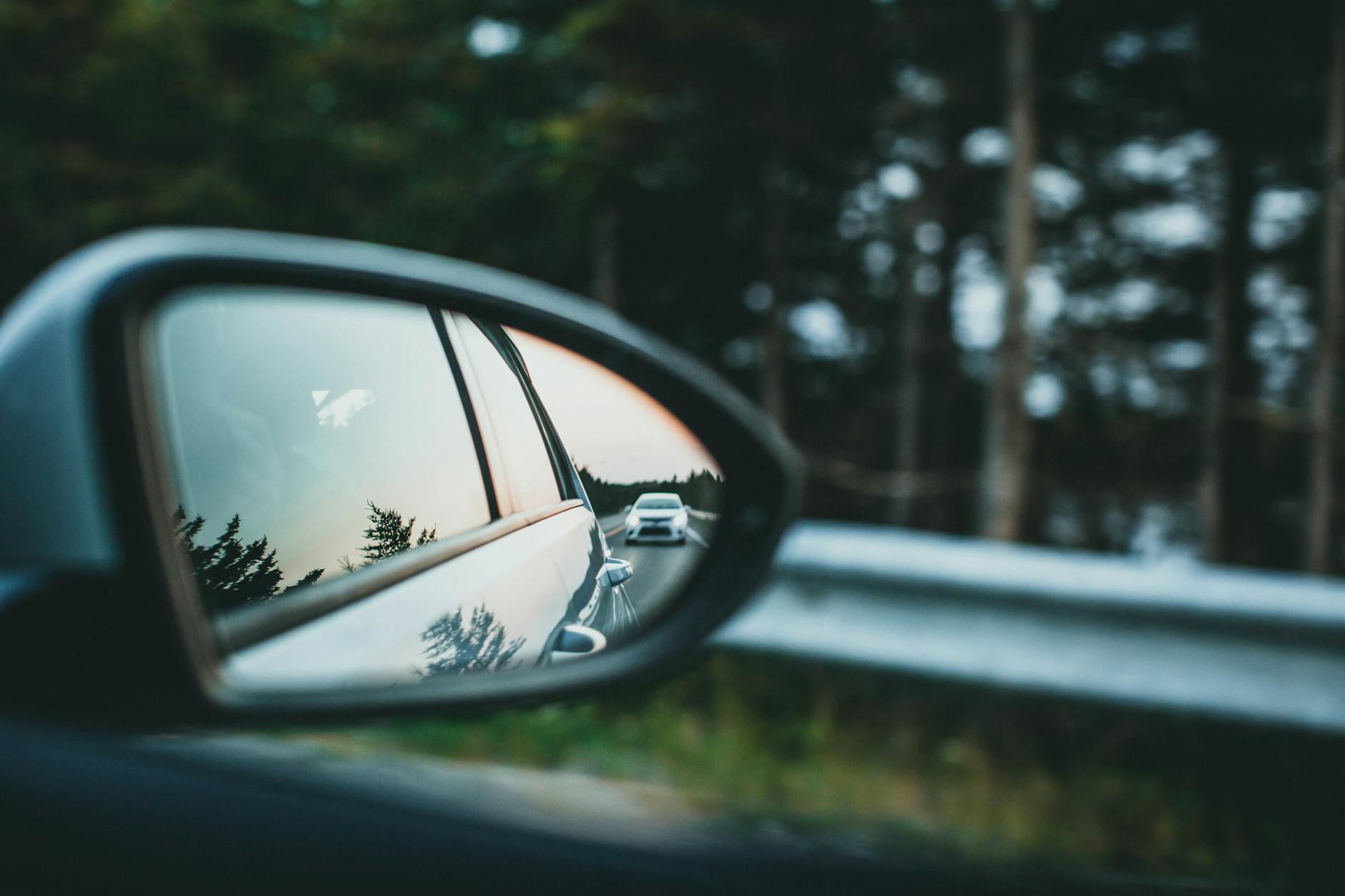 Close-Up Shot of a Side Mirror of a Car