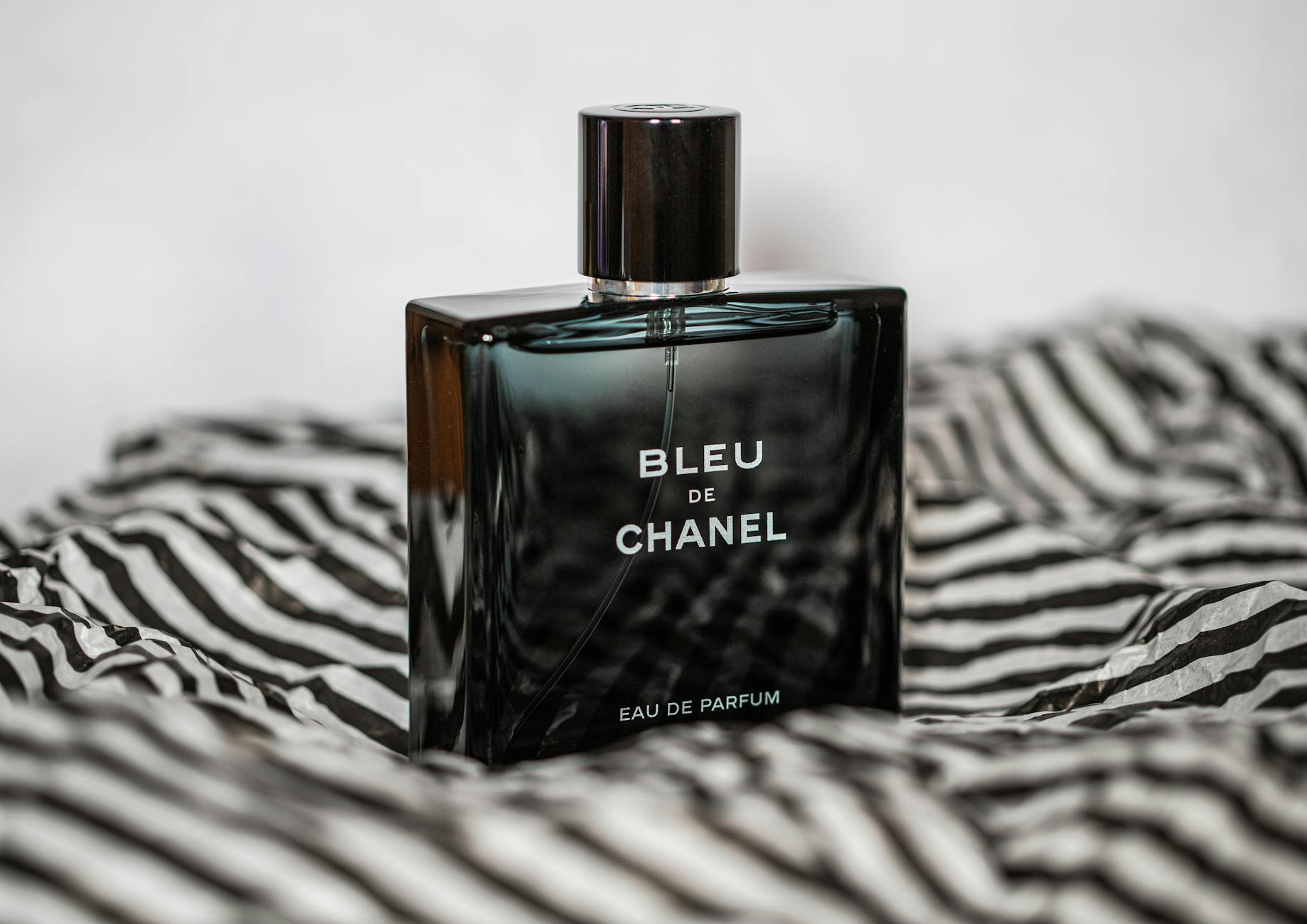 Close-up Photo of Black Perfume Bottle