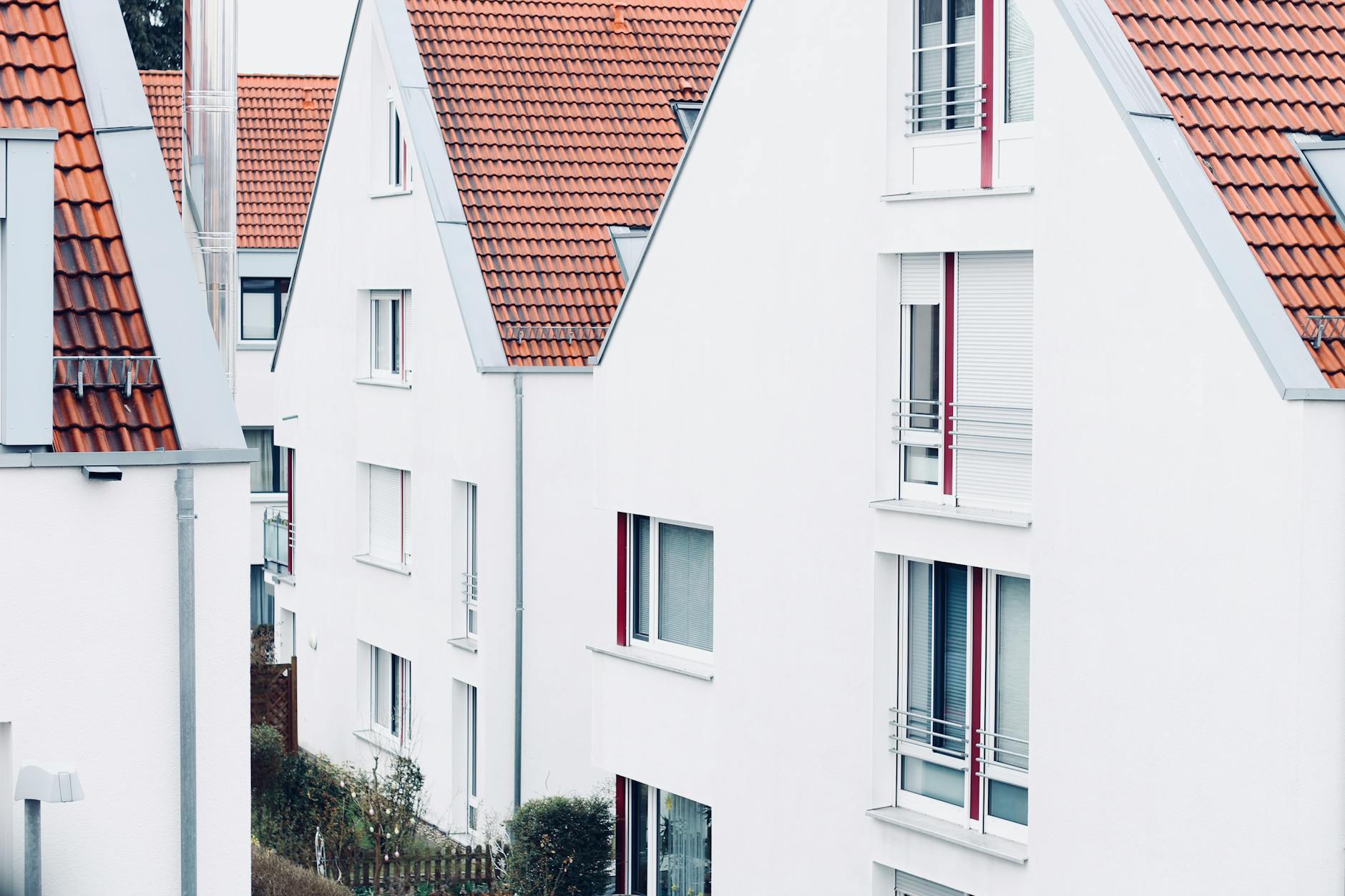 Photo of White Concrete Houses at Daytime